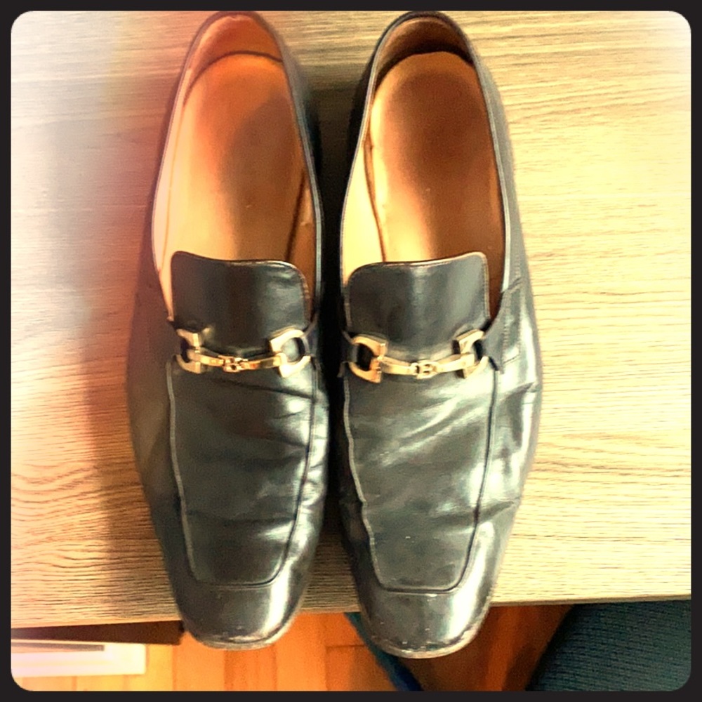 Brown Bally loafers with gold buckles